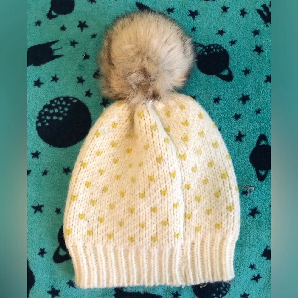 eerie off white and yellow beanie with pompom one size fits most
